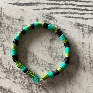Green with black bracelet